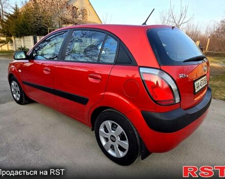 Червоний Кіа Ріо, об'ємом двигуна 1.4 л та пробігом 162 тис. км за 4999 $, фото 9 на Automoto.ua