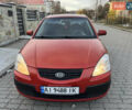 Червоний Кіа Ріо, об'ємом двигуна 1.4 л та пробігом 292 тис. км за 3999 $, фото 2 на Automoto.ua