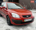 Красный Киа Рио, объемом двигателя 1.4 л и пробегом 110 тыс. км за 5900 $, фото 1 на Automoto.ua