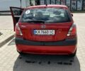 Червоний Кіа Ріо, об'ємом двигуна 1.4 л та пробігом 257 тис. км за 5300 $, фото 4 на Automoto.ua