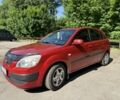 Красный Киа Рио, объемом двигателя 1.3 л и пробегом 155 тыс. км за 6299 $, фото 4 на Automoto.ua