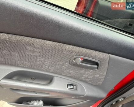 Червоний Кіа Ріо, об'ємом двигуна 1.4 л та пробігом 153 тис. км за 6399 $, фото 20 на Automoto.ua