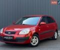 Красный Киа Рио, объемом двигателя 1.6 л и пробегом 233 тыс. км за 5699 $, фото 1 на Automoto.ua