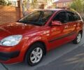 Красный Киа Рио, объемом двигателя 1.4 л и пробегом 161 тыс. км за 5774 $, фото 1 на Automoto.ua