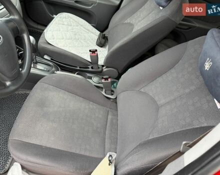 Красный Киа Рио, объемом двигателя 1.4 л и пробегом 153 тыс. км за 6499 $, фото 12 на Automoto.ua