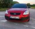 Червоний Кіа Ріо, об'ємом двигуна 1.4 л та пробігом 230 тис. км за 4100 $, фото 10 на Automoto.ua