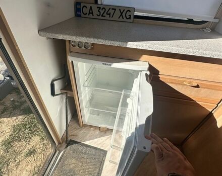 Червоний Кіа Ріо, об'ємом двигуна 1.4 л та пробігом 160 тис. км за 5000 $, фото 7 на Automoto.ua