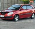 Червоний Кіа Ріо, об'ємом двигуна 1.4 л та пробігом 260 тис. км за 3850 $, фото 1 на Automoto.ua
