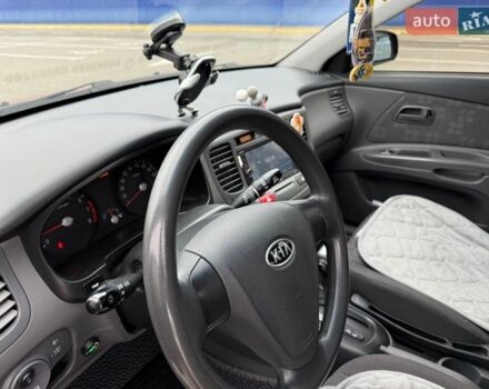 Червоний Кіа Ріо, об'ємом двигуна 1.4 л та пробігом 153 тис. км за 6399 $, фото 16 на Automoto.ua