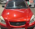 Красный Киа Рио, объемом двигателя 1.4 л и пробегом 214 тыс. км за 6500 $, фото 1 на Automoto.ua
