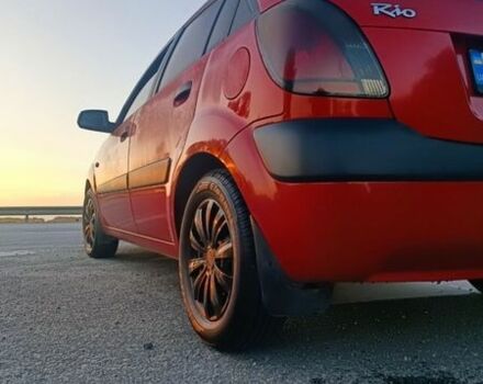 Червоний Кіа Ріо, об'ємом двигуна 1.4 л та пробігом 230 тис. км за 4100 $, фото 6 на Automoto.ua