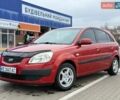 Красный Киа Рио, объемом двигателя 1.4 л и пробегом 153 тыс. км за 6499 $, фото 1 на Automoto.ua