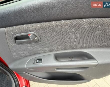 Червоний Кіа Ріо, об'ємом двигуна 1.4 л та пробігом 153 тис. км за 6399 $, фото 21 на Automoto.ua