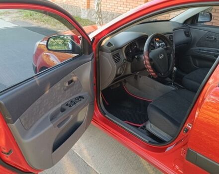 Красный Киа Рио, объемом двигателя 1.4 л и пробегом 161 тыс. км за 5774 $, фото 17 на Automoto.ua