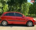 Красный Киа Рио, объемом двигателя 1.4 л и пробегом 155 тыс. км за 5800 $, фото 4 на Automoto.ua