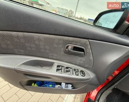Червоний Кіа Ріо, об'ємом двигуна 1.4 л та пробігом 153 тис. км за 6399 $, фото 17 на Automoto.ua