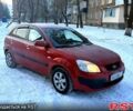Червоний Кіа Ріо, об'ємом двигуна 1.4 л та пробігом 250 тис. км за 4500 $, фото 11 на Automoto.ua