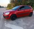 Червоний Кіа Ріо, об'ємом двигуна 1.4 л та пробігом 230 тис. км за 4100 $, фото 3 на Automoto.ua