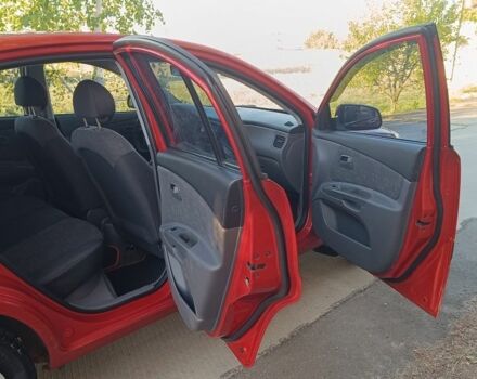 Красный Киа Рио, объемом двигателя 1.4 л и пробегом 161 тыс. км за 5774 $, фото 11 на Automoto.ua