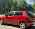 Красный Киа Рио, объемом двигателя 1.4 л и пробегом 155 тыс. км за 5800 $, фото 1 на Automoto.ua