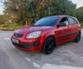 Червоний Кіа Ріо, об'ємом двигуна 1.4 л та пробігом 230 тис. км за 4100 $, фото 1 на Automoto.ua