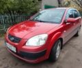 Красный Киа Рио, объемом двигателя 1.4 л и пробегом 218 тыс. км за 4200 $, фото 1 на Automoto.ua