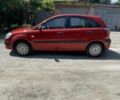 Красный Киа Рио, объемом двигателя 1.4 л и пробегом 205 тыс. км за 4499 $, фото 2 на Automoto.ua