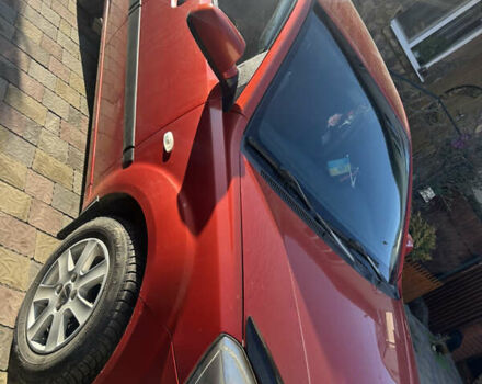 Красный Киа Рио, объемом двигателя 1.4 л и пробегом 230 тыс. км за 4300 $, фото 2 на Automoto.ua