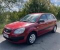 Красный Киа Рио, объемом двигателя 1.4 л и пробегом 224 тыс. км за 4200 $, фото 1 на Automoto.ua
