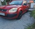 Красный Киа Рио, объемом двигателя 1.4 л и пробегом 275 тыс. км за 4000 $, фото 1 на Automoto.ua