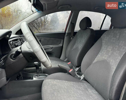 Красный Киа Рио, объемом двигателя 1.4 л и пробегом 189 тыс. км за 6490 $, фото 28 на Automoto.ua