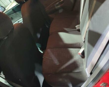 Красный Киа Рио, объемом двигателя 1.4 л и пробегом 174 тыс. км за 4500 $, фото 2 на Automoto.ua