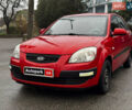 Красный Киа Рио, объемом двигателя 1.4 л и пробегом 189 тыс. км за 6490 $, фото 1 на Automoto.ua