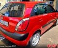 Красный Киа Рио, объемом двигателя 1.4 л и пробегом 180 тыс. км за 3800 $, фото 1 на Automoto.ua