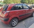 Красный Киа Рио, объемом двигателя 1.4 л и пробегом 230 тыс. км за 3850 $, фото 2 на Automoto.ua