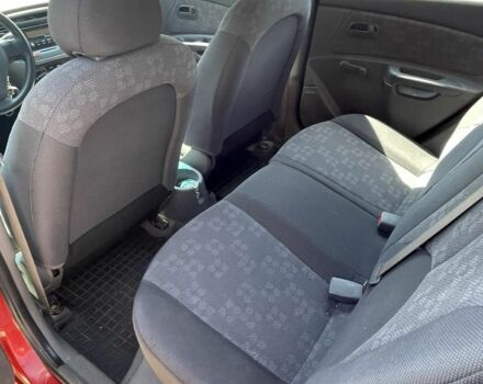 Красный Киа Рио, объемом двигателя 1.4 л и пробегом 205 тыс. км за 4499 $, фото 9 на Automoto.ua
