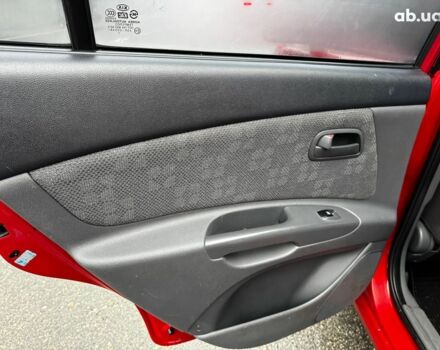 Красный Киа Рио, объемом двигателя 1.4 л и пробегом 189 тыс. км за 6490 $, фото 20 на Automoto.ua