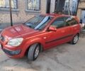 Красный Киа Рио, объемом двигателя 1.4 л и пробегом 200 тыс. км за 3800 $, фото 1 на Automoto.ua