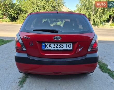 Червоний Кіа Ріо, об'ємом двигуна 1.4 л та пробігом 241 тис. км за 4400 $, фото 1 на Automoto.ua