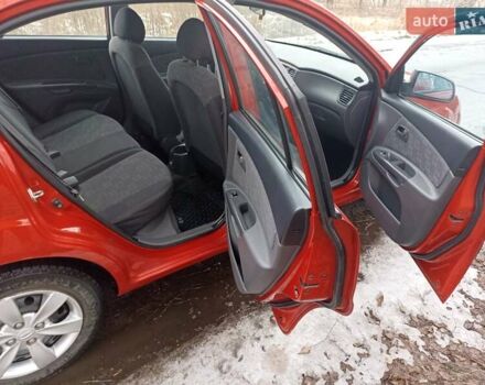 Червоний Кіа Ріо, об'ємом двигуна 1.4 л та пробігом 202 тис. км за 3999 $, фото 10 на Automoto.ua