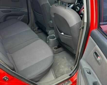 Красный Киа Рио, объемом двигателя 1.4 л и пробегом 230 тыс. км за 3900 $, фото 4 на Automoto.ua