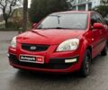 Красный Киа Рио, объемом двигателя 1.4 л и пробегом 189 тыс. км за 6490 $, фото 1 на Automoto.ua