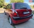 Червоний Кіа Ріо, об'ємом двигуна 1.4 л та пробігом 241 тис. км за 4400 $, фото 1 на Automoto.ua