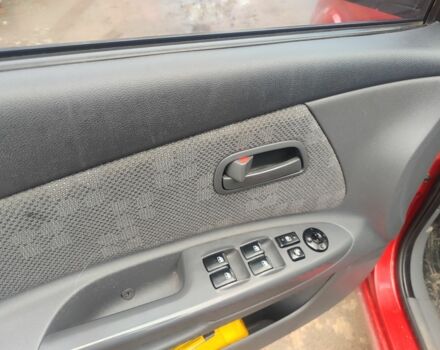 Красный Киа Рио, объемом двигателя 1.4 л и пробегом 218 тыс. км за 4200 $, фото 7 на Automoto.ua