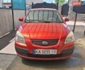 Червоний Кіа Ріо, об'ємом двигуна 1.4 л та пробігом 190 тис. км за 3800 $, фото 1 на Automoto.ua