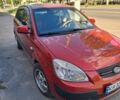 Красный Киа Рио, объемом двигателя 1.4 л и пробегом 230 тыс. км за 3850 $, фото 1 на Automoto.ua