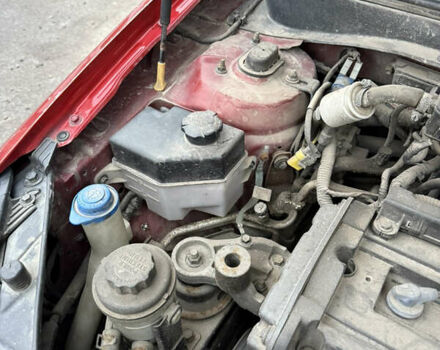 Красный Киа Рио, объемом двигателя 1.4 л и пробегом 288 тыс. км за 4700 $, фото 14 на Automoto.ua