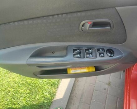 Червоний Кіа Ріо, об'ємом двигуна 1.4 л та пробігом 184 тис. км за 4500 $, фото 5 на Automoto.ua