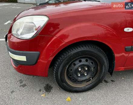 Красный Киа Рио, объемом двигателя 1.4 л и пробегом 187 тыс. км за 6000 $, фото 1 на Automoto.ua