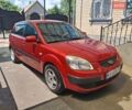 Червоний Кіа Ріо, об'ємом двигуна 1.4 л та пробігом 190 тис. км за 3800 $, фото 2 на Automoto.ua